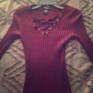 A burgundy ribbed Shirt